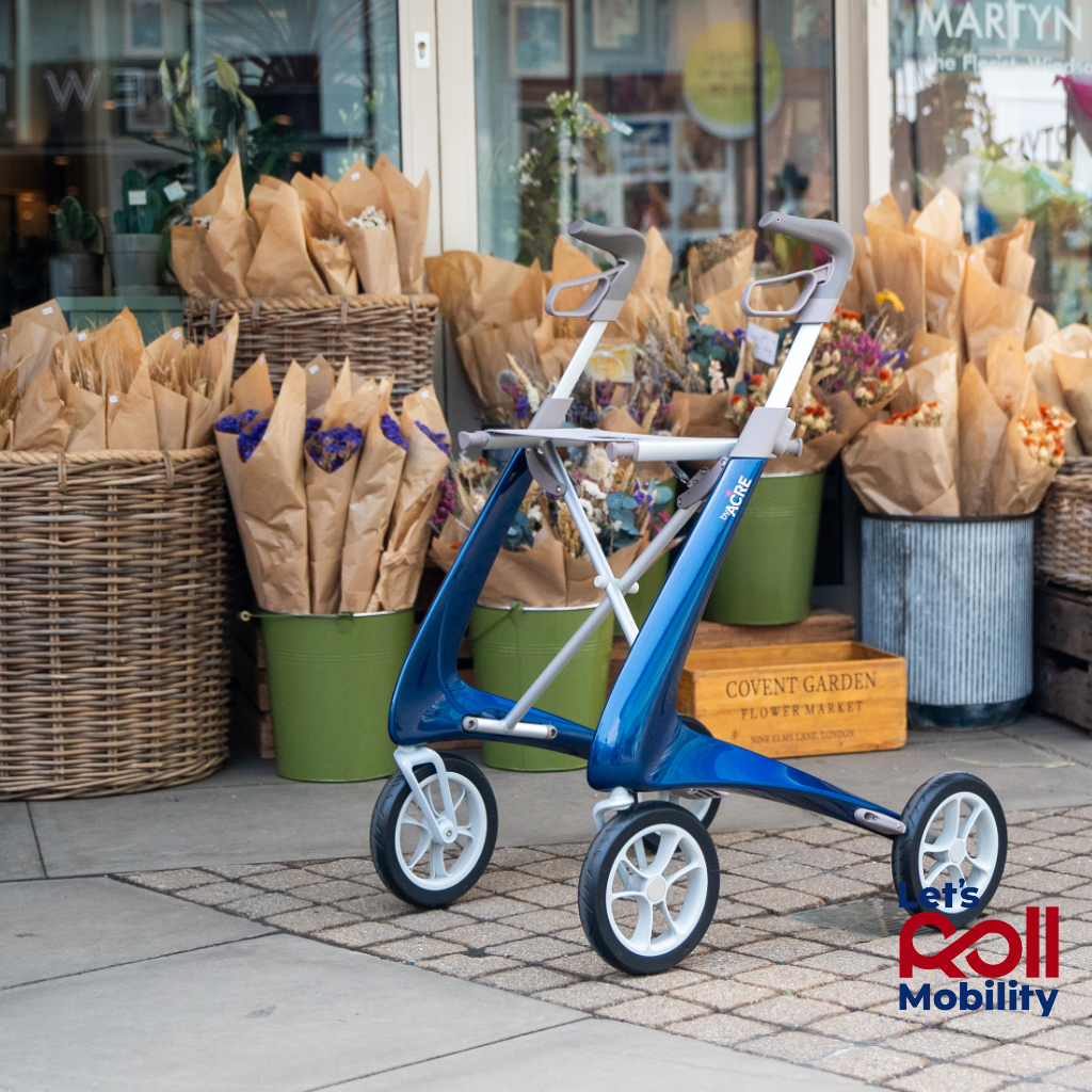 byACRE Ultralight in blue next to flowers