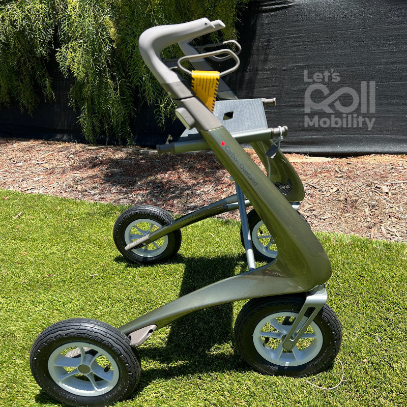 Defender Green byACRE Carbon Overland rollator in direct sunlight
