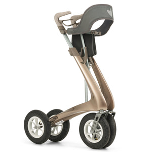 A Bentley Brown byACRE Rollator folded with the padded backrest on 
